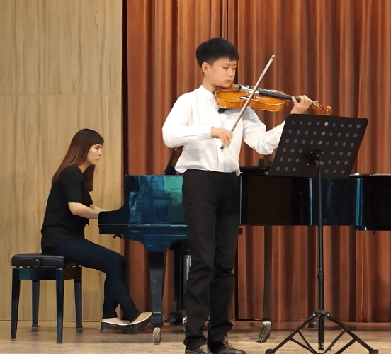 Teacher Teaching Piano 4