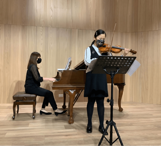 Teacher Teaching Piano 7